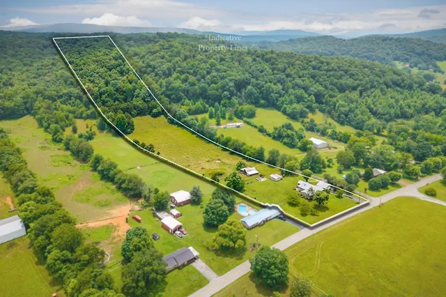 a view of a swimming pool and mountain