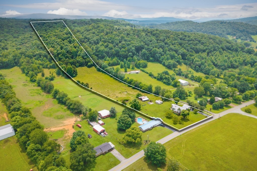 1653 Lester Flatt Road Sparta, TN 38583 - Photo 5 of 59 a view of a swimming pool and mountain