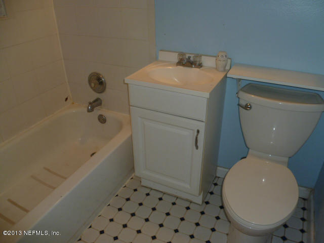 1722 Cortez Road Jacksonville, FL 32246 - Photo 10 of 10 a bathroom with a sink and a toilet