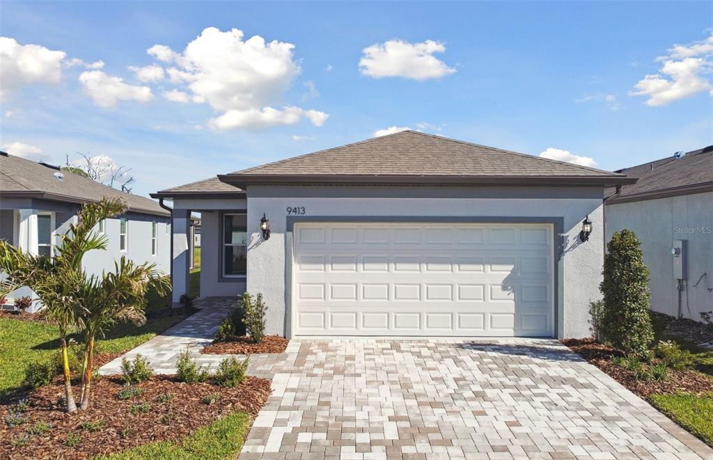 9413 Ballaster Pointe Loop Palmetto, FL 34221 - Photo 1 of 1 a front view of a house