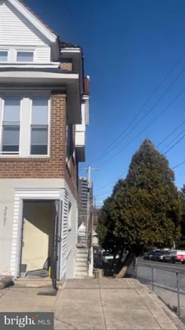 a view of a building with a street