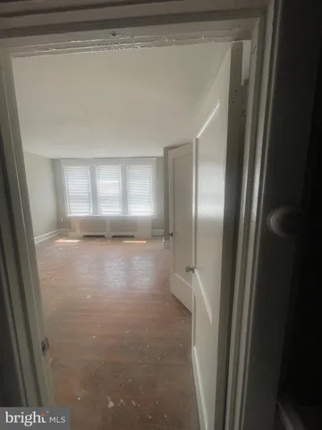 a bathroom with a toilet a sink and bath tub