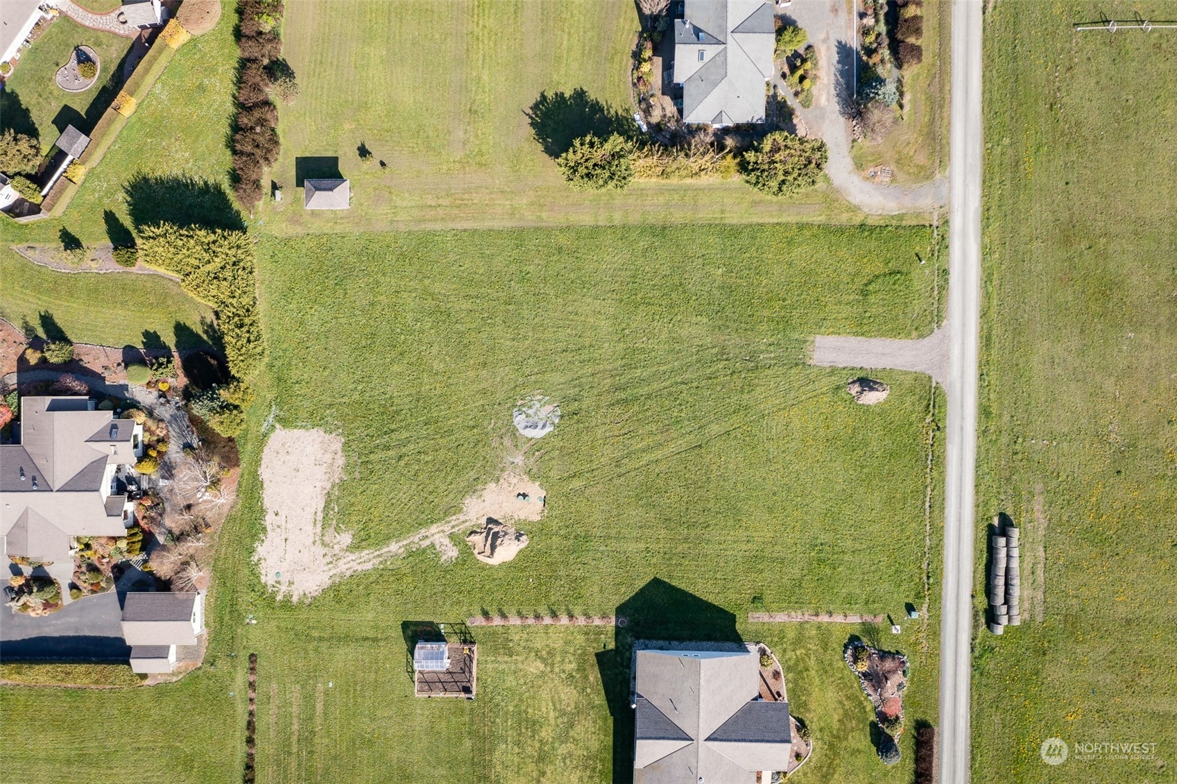 52 Tulip Lane Sequim, WA 98382 - Photo 27 of 40 an aerial view of residential house with pool and yard