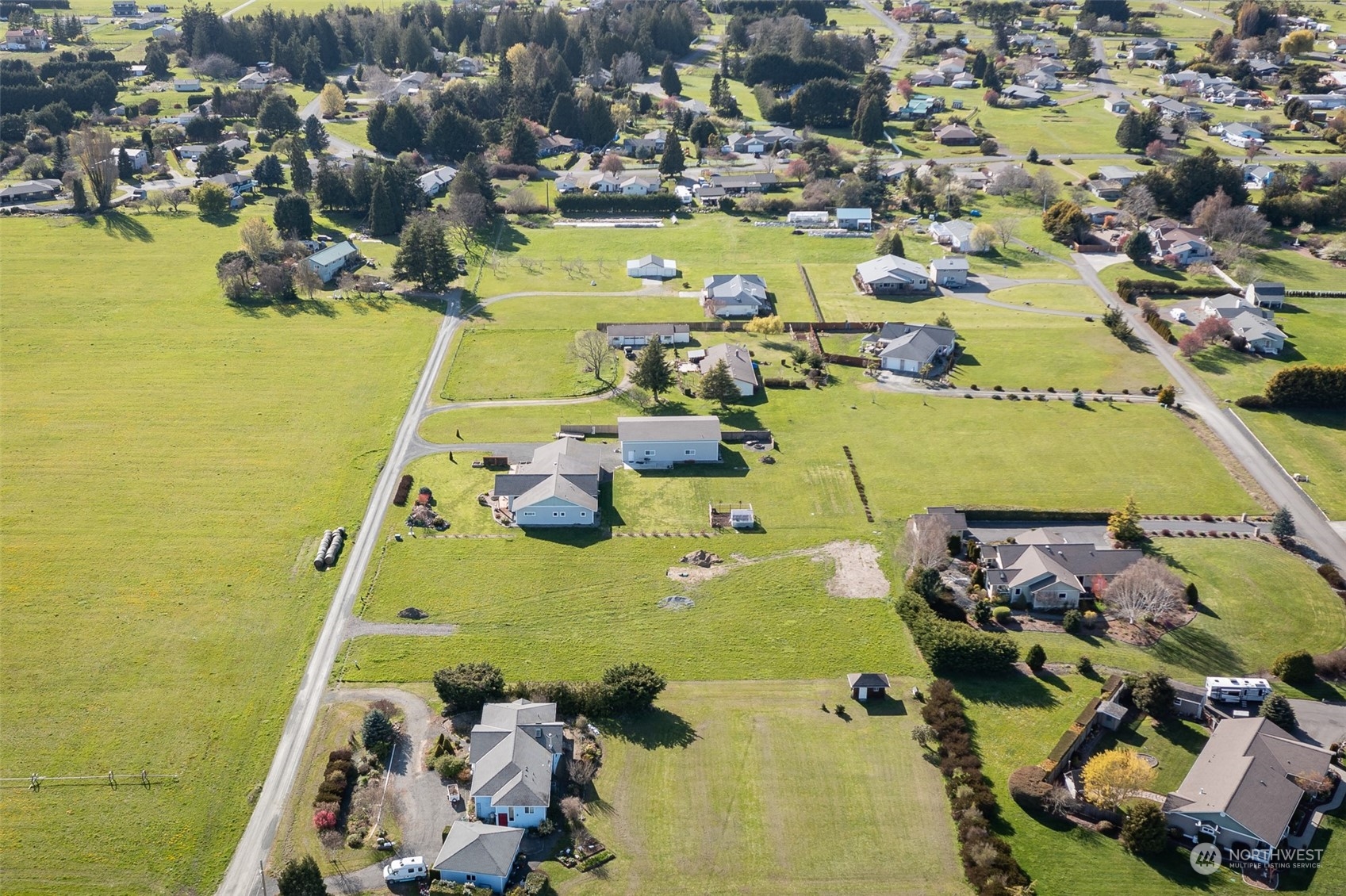 52 Tulip Lane Sequim, WA 98382 - Photo 36 of 40 an aerial view of residential houses with outdoor space