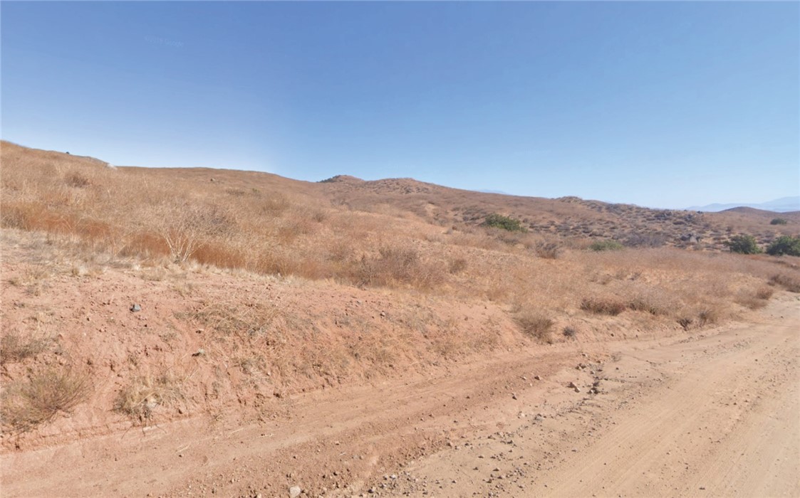 2 Blue Sky Road Perris, CA 92570 - Photo 3 of 6 a view of a dry field