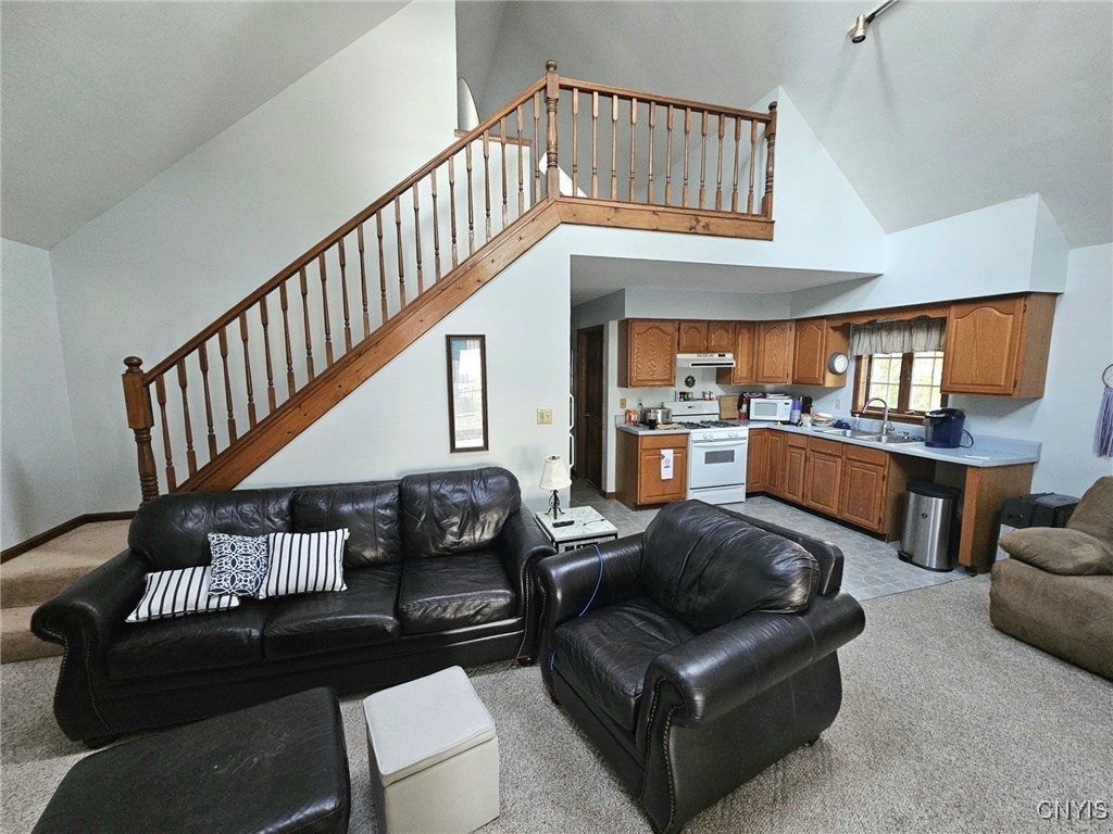 129 Fire Lane 7 Cato, NY 13080 - Photo 18 of 33 FRONT OF HOUSE LIVING ROOM AND LOFT
