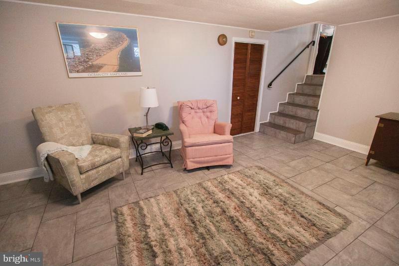 701 Grantwood Road Baltimore, MD 21220 - Photo 26 of 30 Finished Lower Level With Fireplace