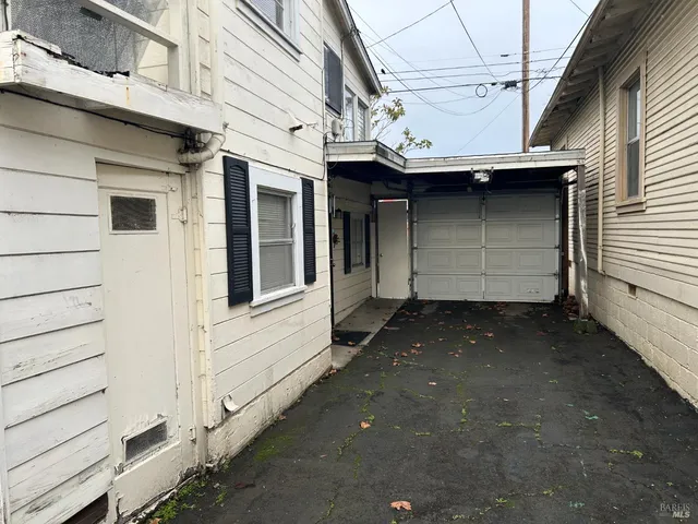 a view of a house with a garage