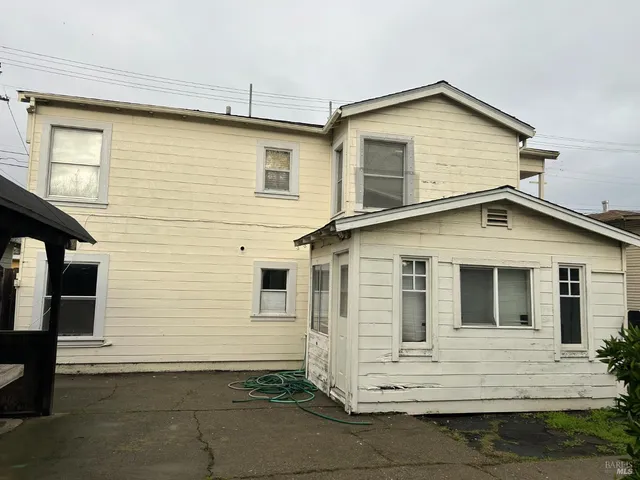 a view of a house with white door
