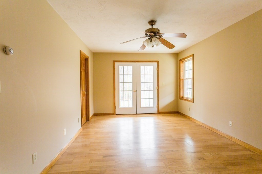 147 Ragged Hill Road West Brookfield, MA 01585 - Photo 16 of 42 a view of an empty room with a window
