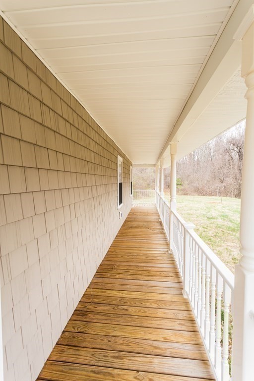 147 Ragged Hill Road West Brookfield, MA 01585 - Photo 28 of 42 a view of a balcony with wooden floor