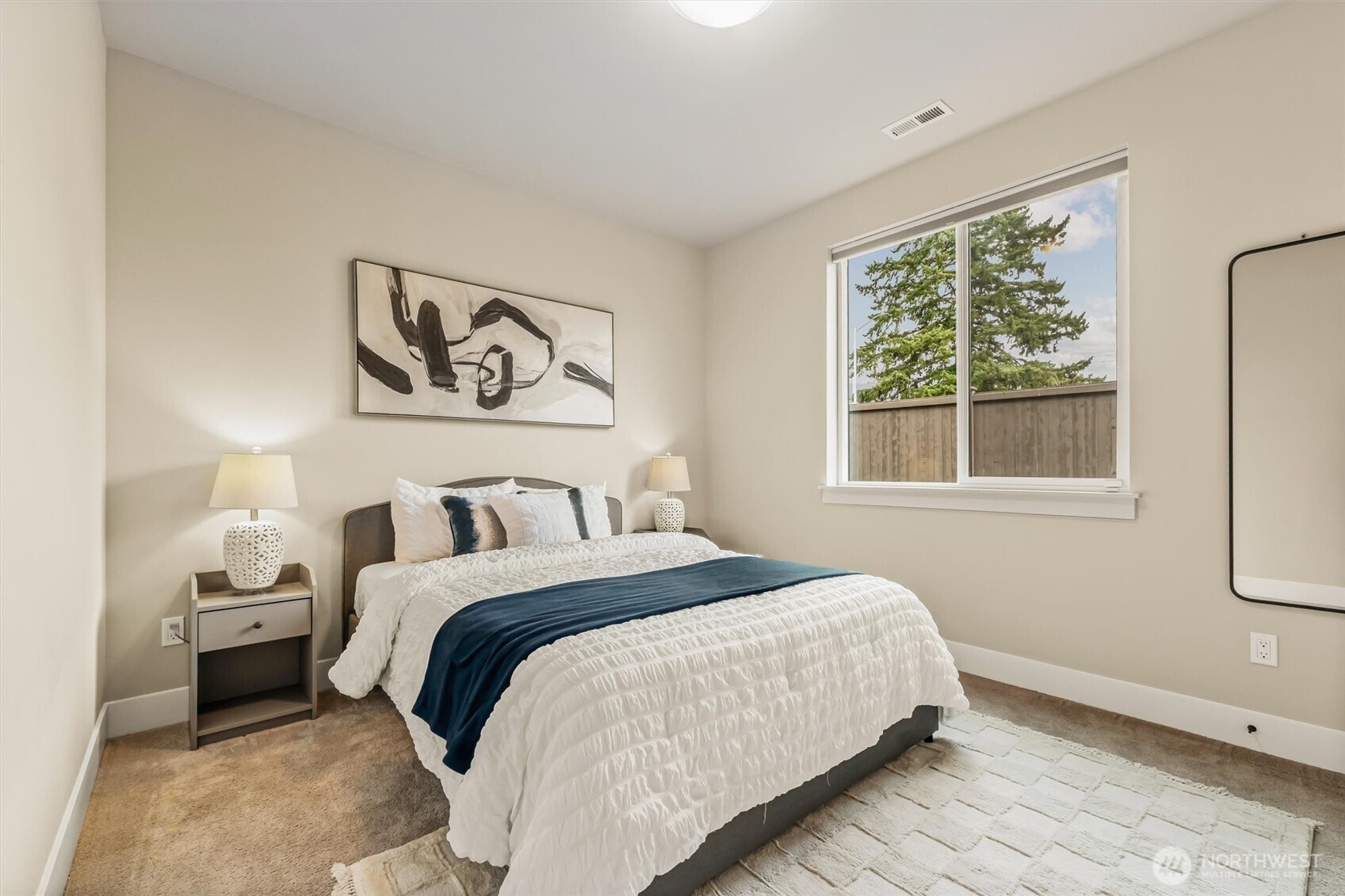 4418 242nd Place Southeast Bothell, WA 98021 - Photo 16 of 40 a bedroom with bed and a window