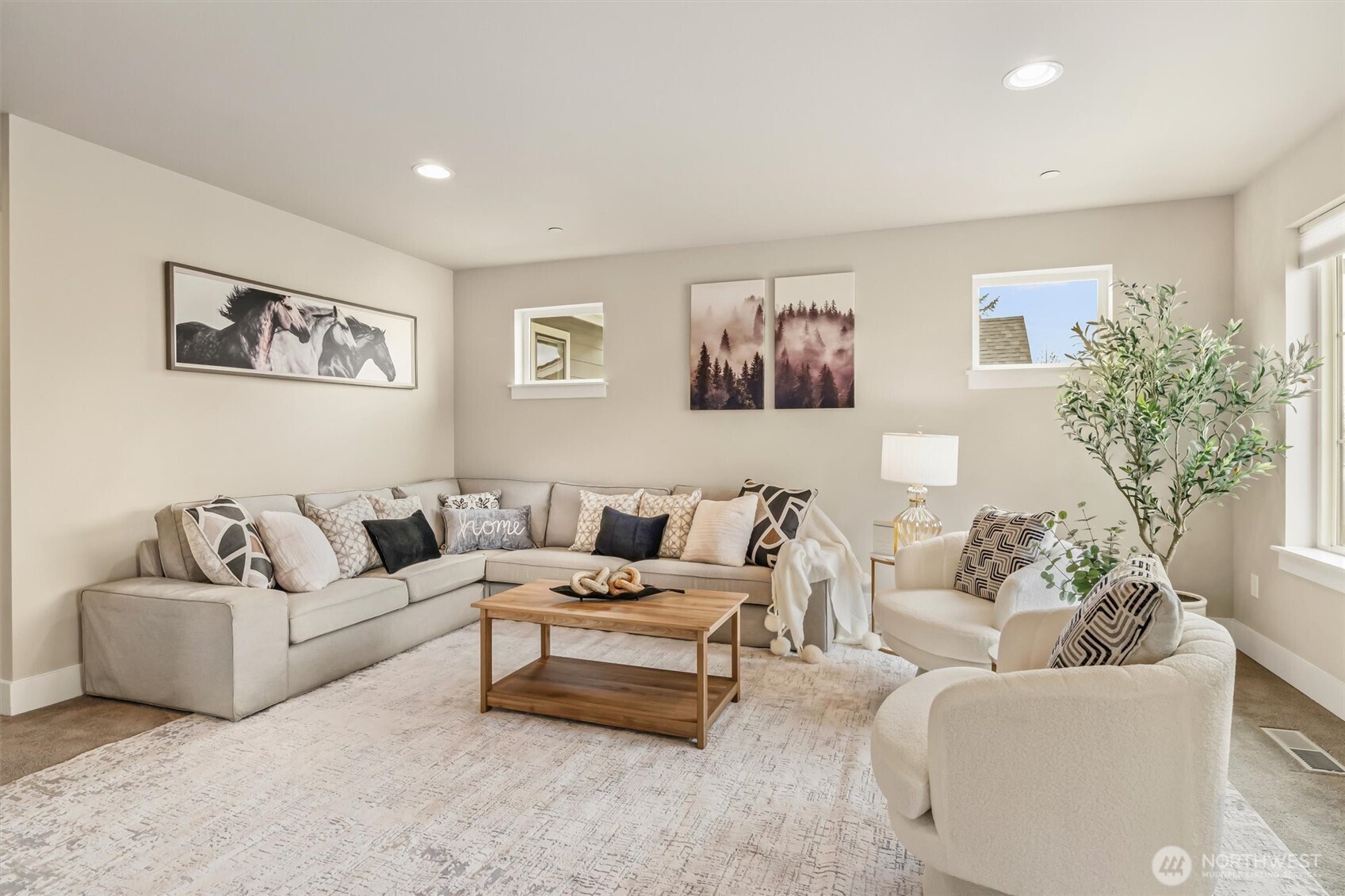 4418 242nd Place Southeast Bothell, WA 98021 - Photo 19 of 40 a living room with furniture and a couch