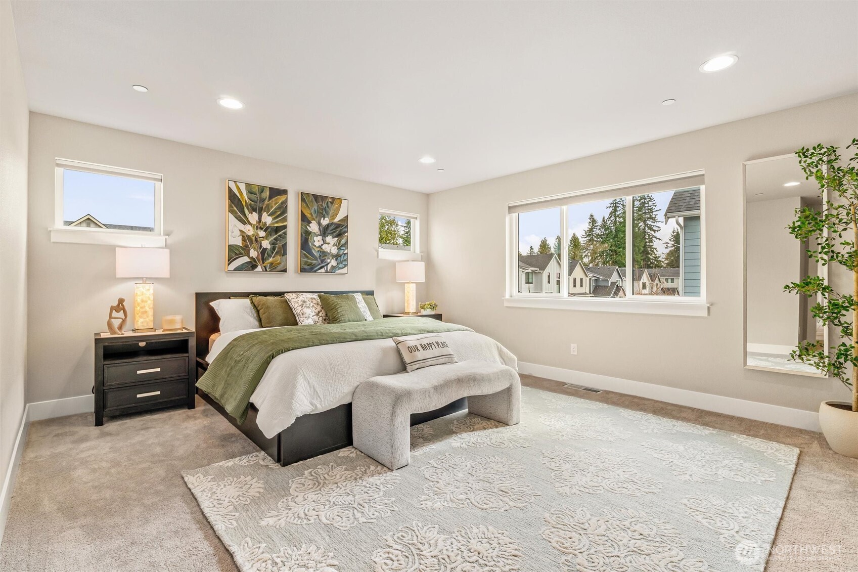 4418 242nd Place Southeast Bothell, WA 98021 - Photo 22 of 40 a bedroom with a bed and a painting on the wall