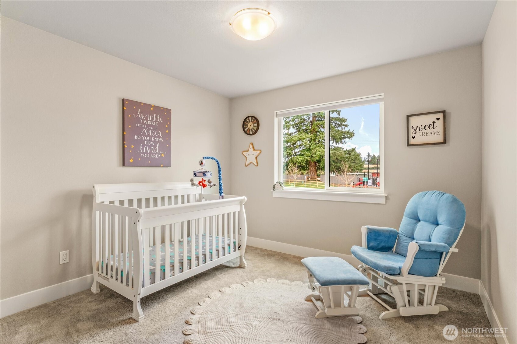 4418 242nd Place Southeast Bothell, WA 98021 - Photo 29 of 40 a bedroom with a bed and a window