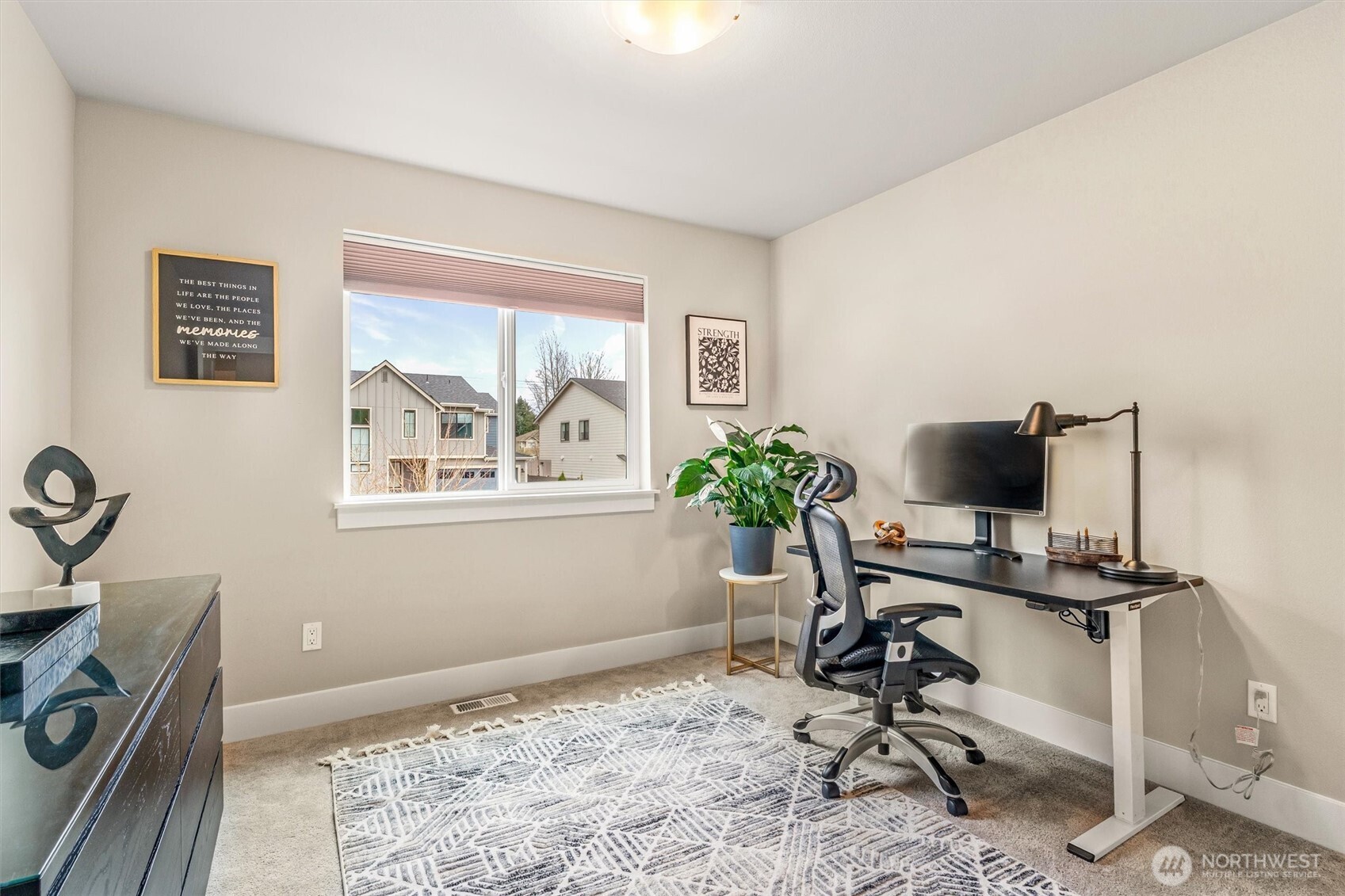 4418 242nd Place Southeast Bothell, WA 98021 - Photo 30 of 40 a view of a workspace with furniture and a window