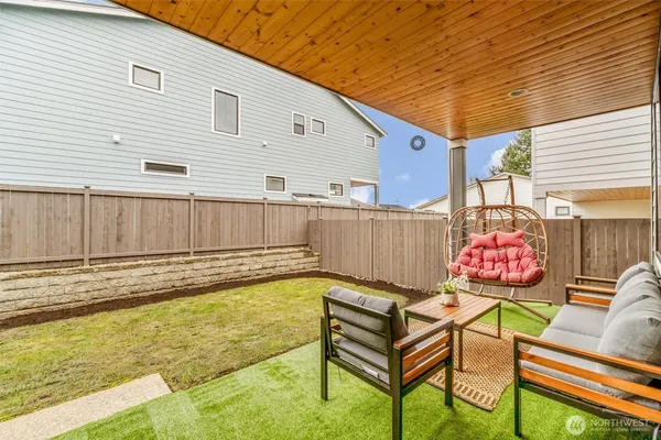 a view of backyard with a small cabin