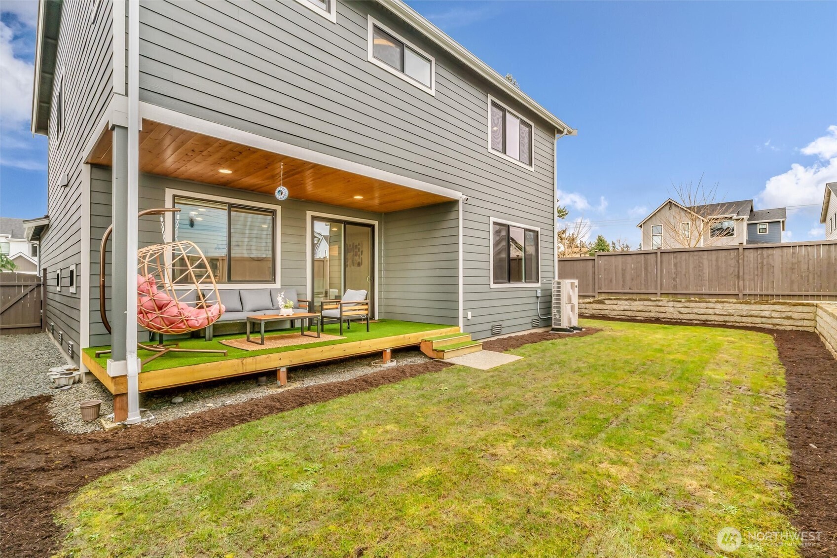 4418 242nd Place Southeast Bothell, WA 98021 - Photo 33 of 40 a view of a patio with swimming pool table and chairs