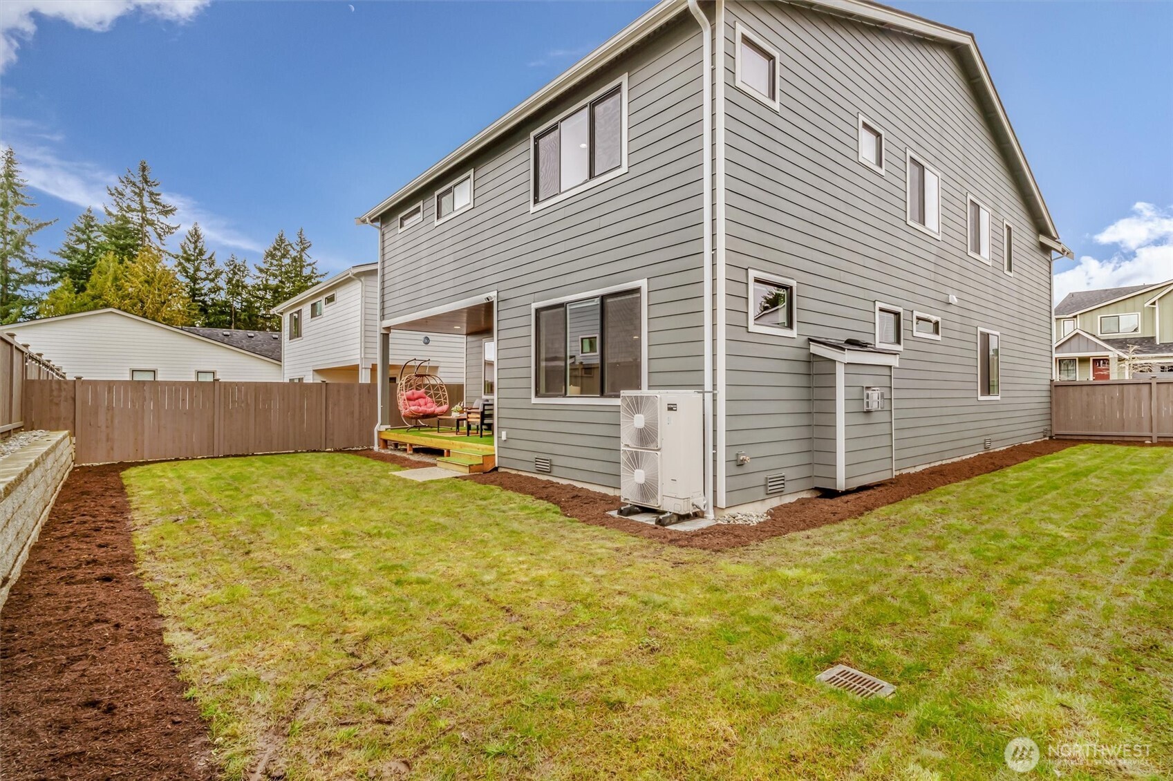 4418 242nd Place Southeast Bothell, WA 98021 - Photo 34 of 40 a view of backyard with a small cabin