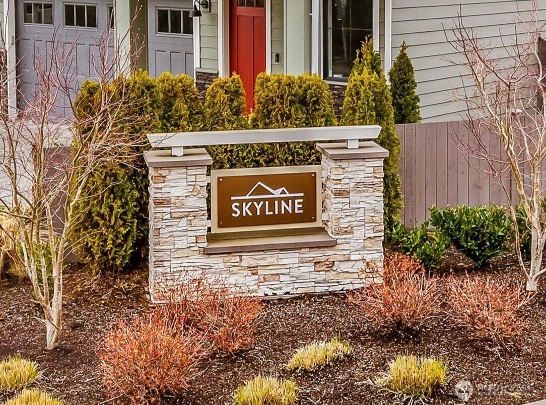 4418 242nd Place Southeast Bothell, WA 98021 - Photo 40 of 40 a sign on the side of a building