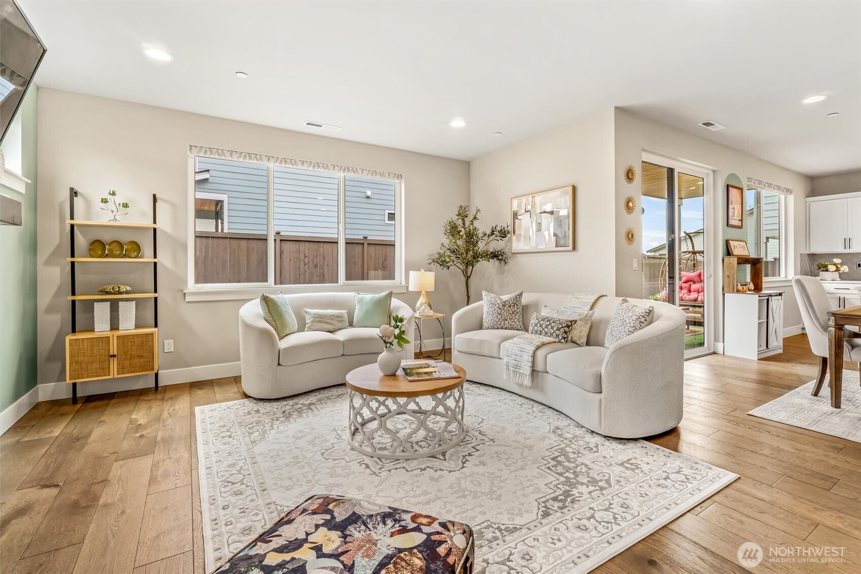 4418 242nd Place Southeast Bothell, WA 98021 - Photo 8 of 40 a living room with furniture and a rug