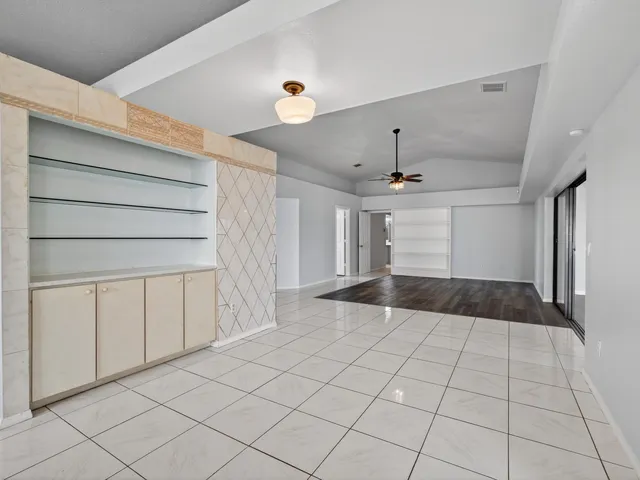 a view of an empty room and window