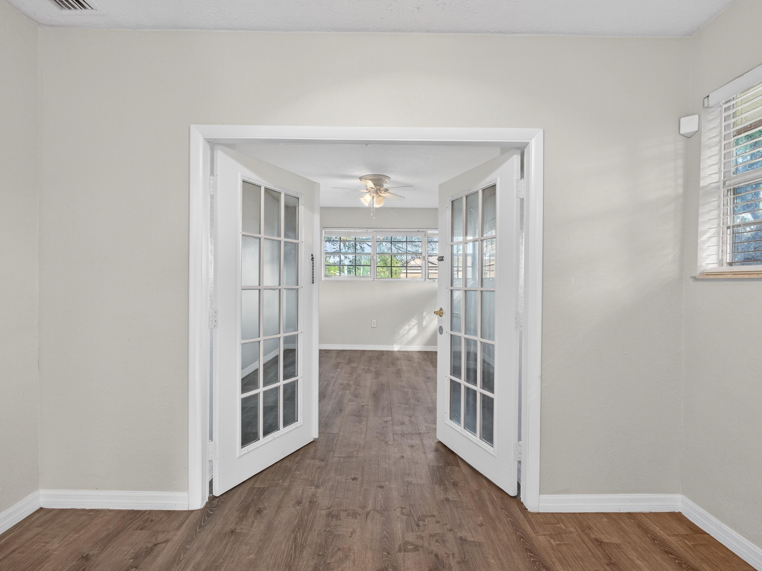 566 Southeast Damask Avenue Port St. Lucie, FL 34983 - Photo 22 of 30 a view of livingroom with furniture and windows
