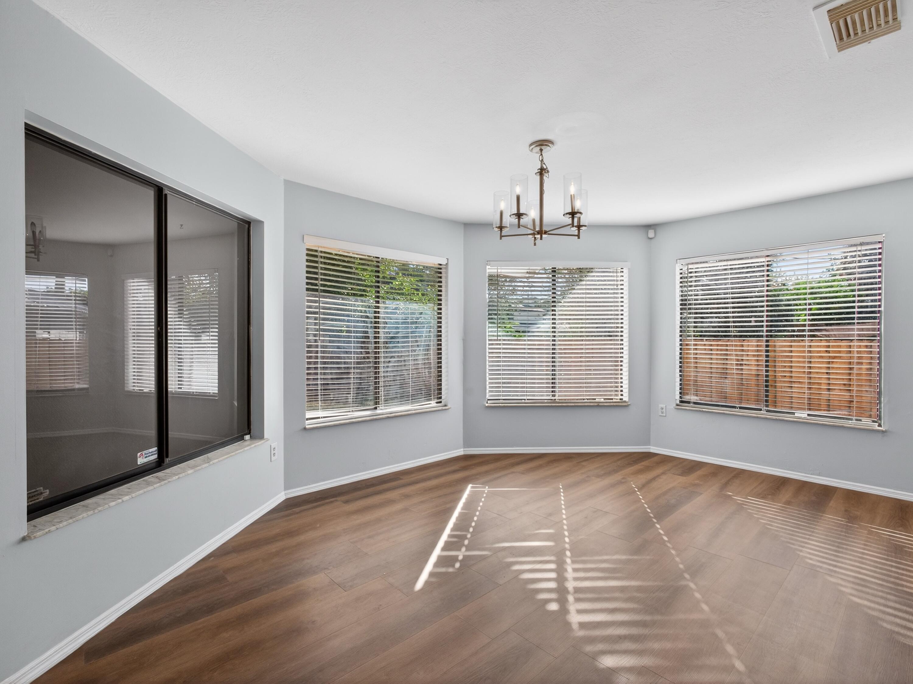566 Southeast Damask Avenue Port St. Lucie, FL 34983 - Photo 10 of 30 a view of an empty room with a window