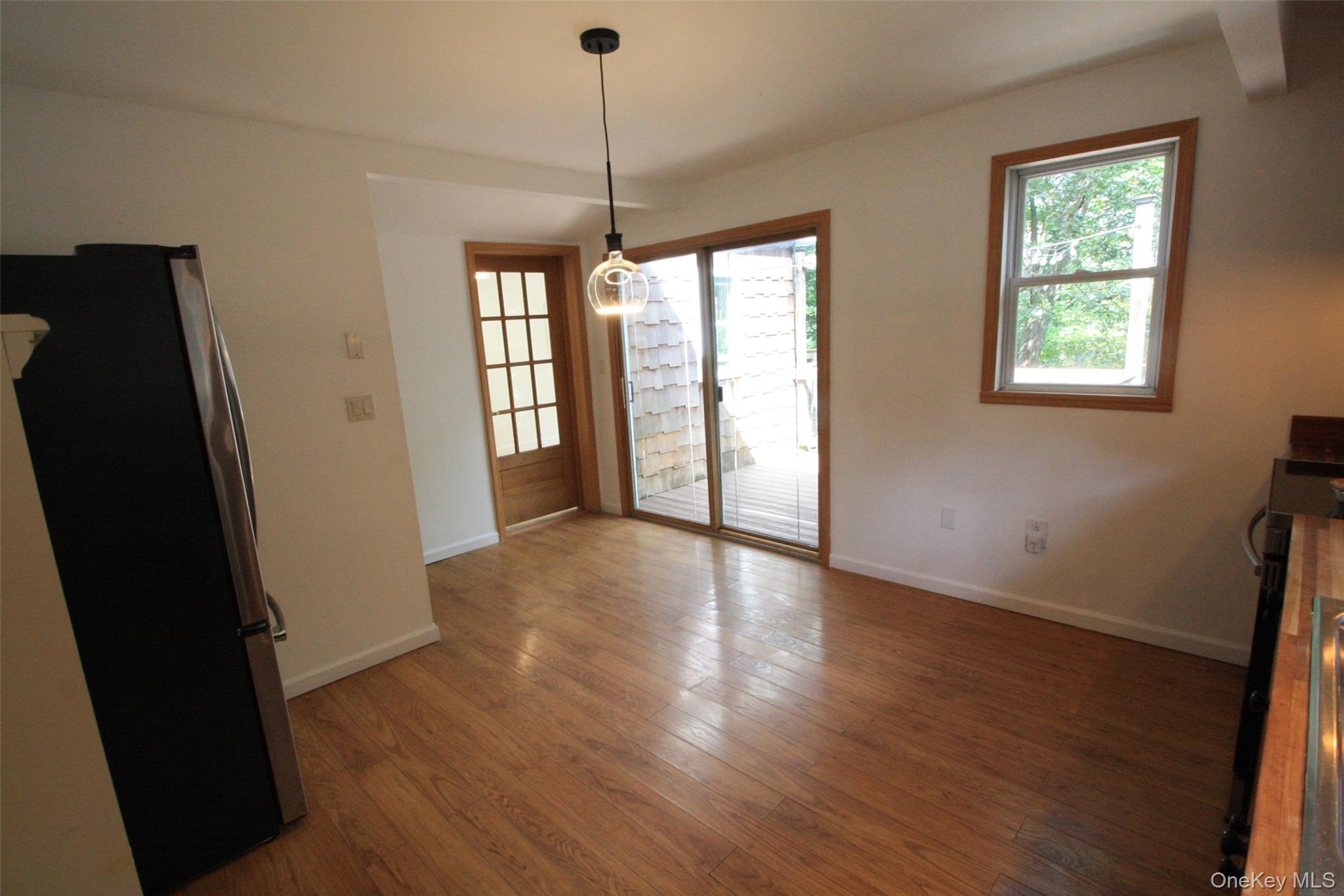 50 Mt Hope Road Carmel, NY 10512 - Photo 9 of 13 open kitchen area toward deck doors