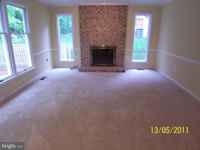 7812 Belleflower Drive Springfield, VA 22152 - Photo 11 of 28 Family Room with Fireplace