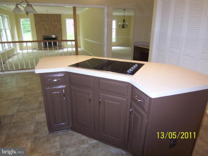 7812 Belleflower Drive Springfield, VA 22152 - Photo 20 of 28 Kitchen Island with new Cooktop