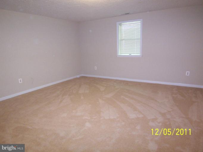 7812 Belleflower Drive Springfield, VA 22152 - Photo 3 of 28 Lower Level Bedroom w/ Walk-in closet
