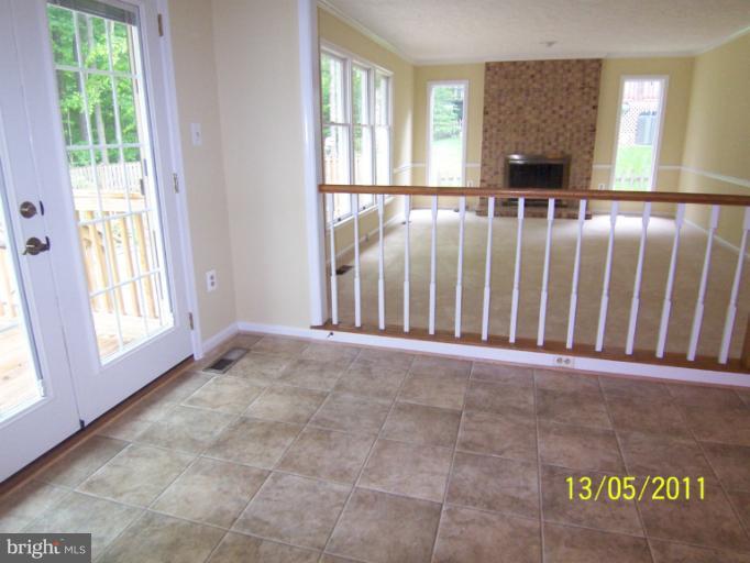 7812 Belleflower Drive Springfield, VA 22152 - Photo 21 of 28 Kitchen table space w/ French door to deck