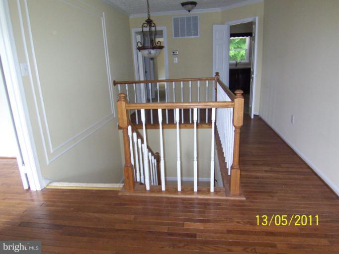 7812 Belleflower Drive Springfield, VA 22152 - Photo 9 of 28 Foyer with Hardwoods