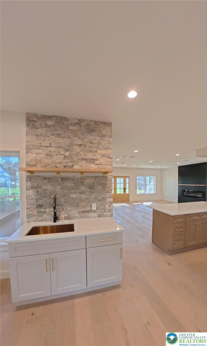 41 South 2nd Street Emmaus, PA 18049 - Photo 14 of 37 a kitchen with kitchen island cabinets and oven