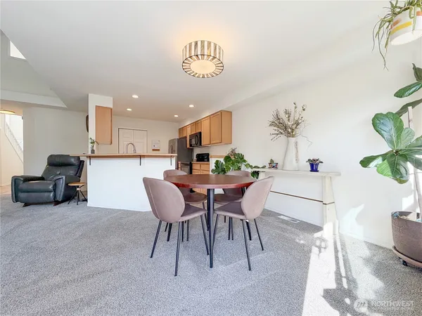 a view of a dining room with furniture