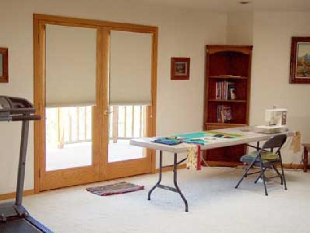 12804 Douglas Road Yakima, WA 98908 - Photo 7 of 9 a view of a workspace with furniture and a window