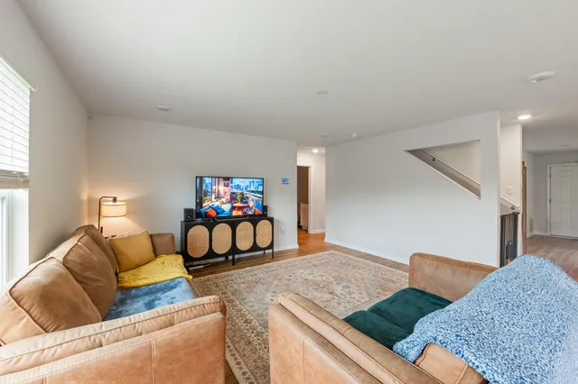 a living room with furniture and a couch