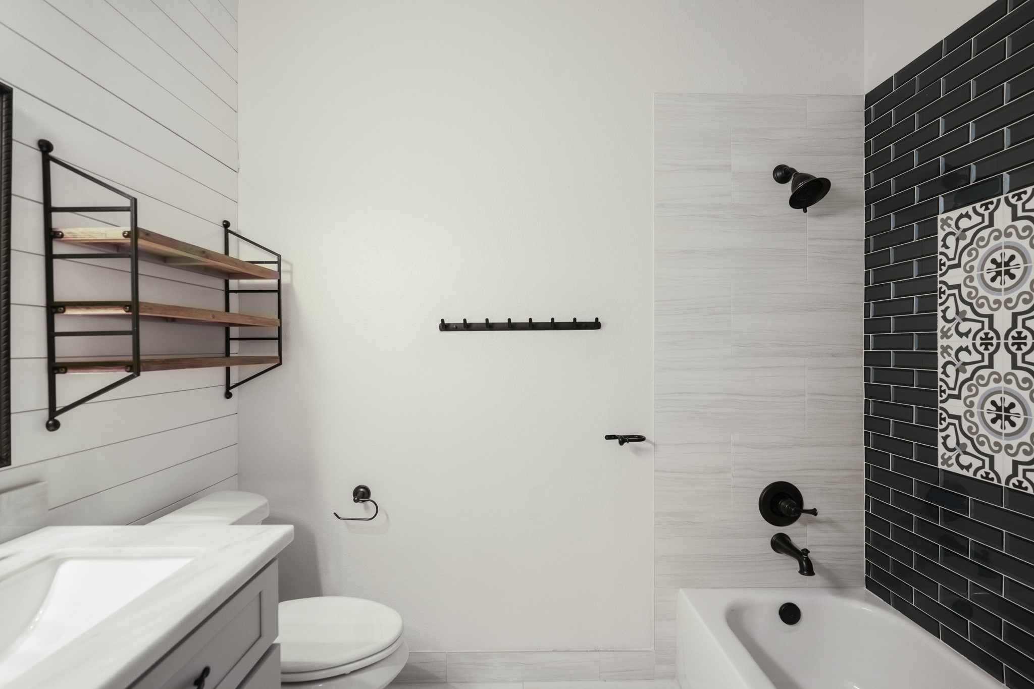 5802 Sawyer Bend Lane Spring, TX 77379 - Photo 27 of 50 a bathroom with a sink toilet and shower