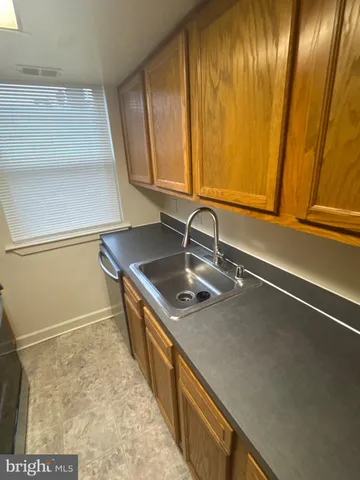 a kitchen with a stove and a microwave
