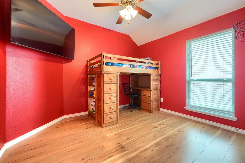 5604 Durst Lane Forney, TX 75126 - Photo 17 of 31 a view of an empty room with window and chandelier fan