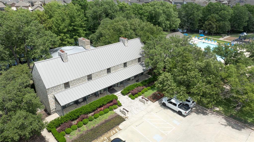 5604 Durst Lane Forney, TX 75126 - Photo 28 of 31 an aerial view of a house with a yard and trees