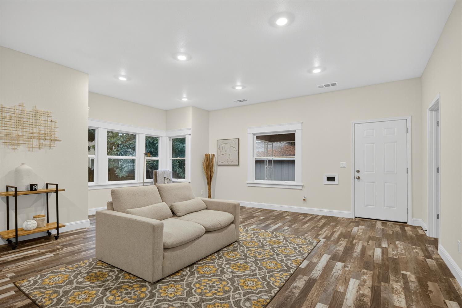 400 Pacific Lodi, CA 95242 - Photo 14 of 50 a living room with furniture and windows