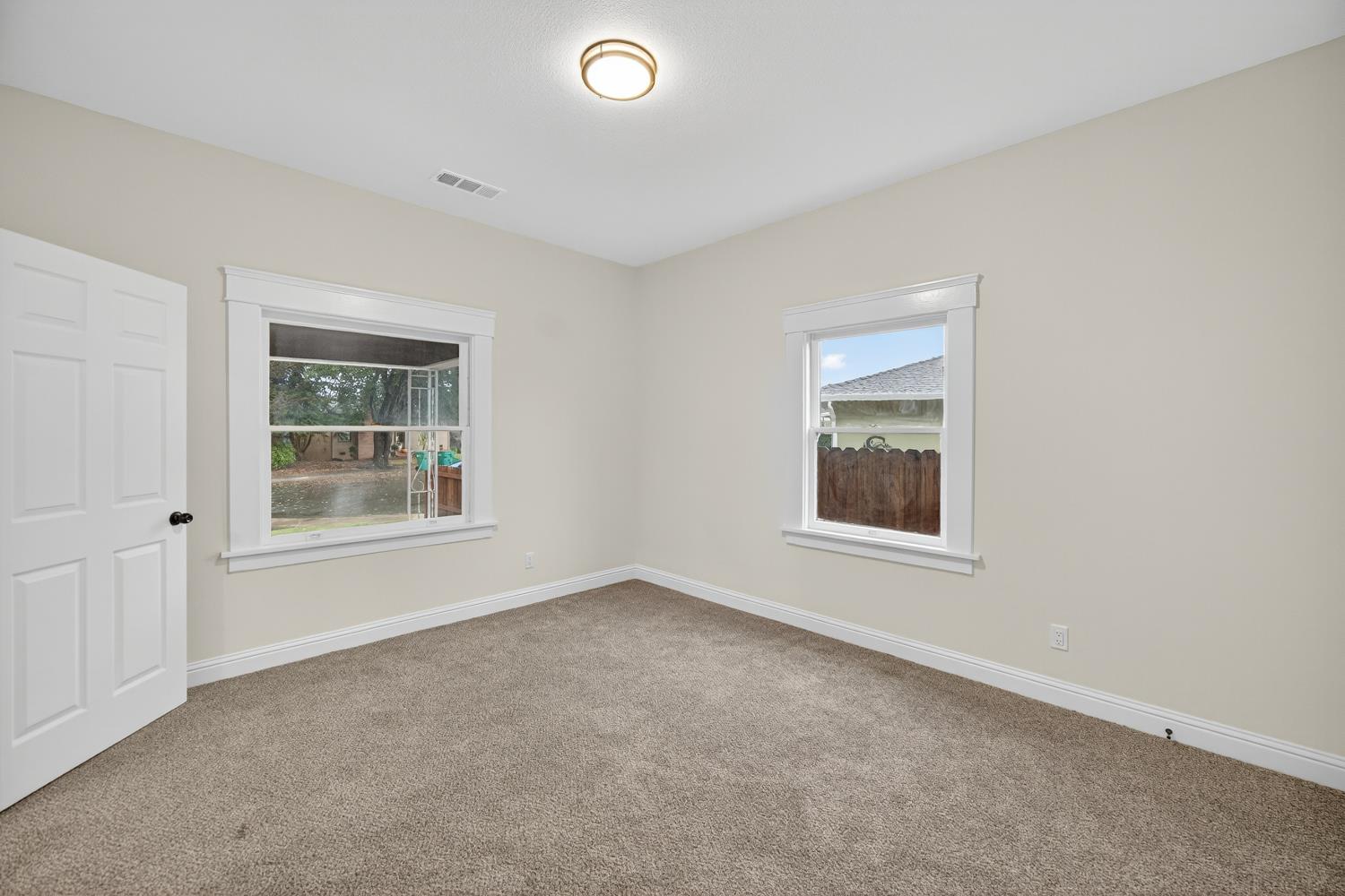400 Pacific Lodi, CA 95242 - Photo 18 of 50 an empty room with a window