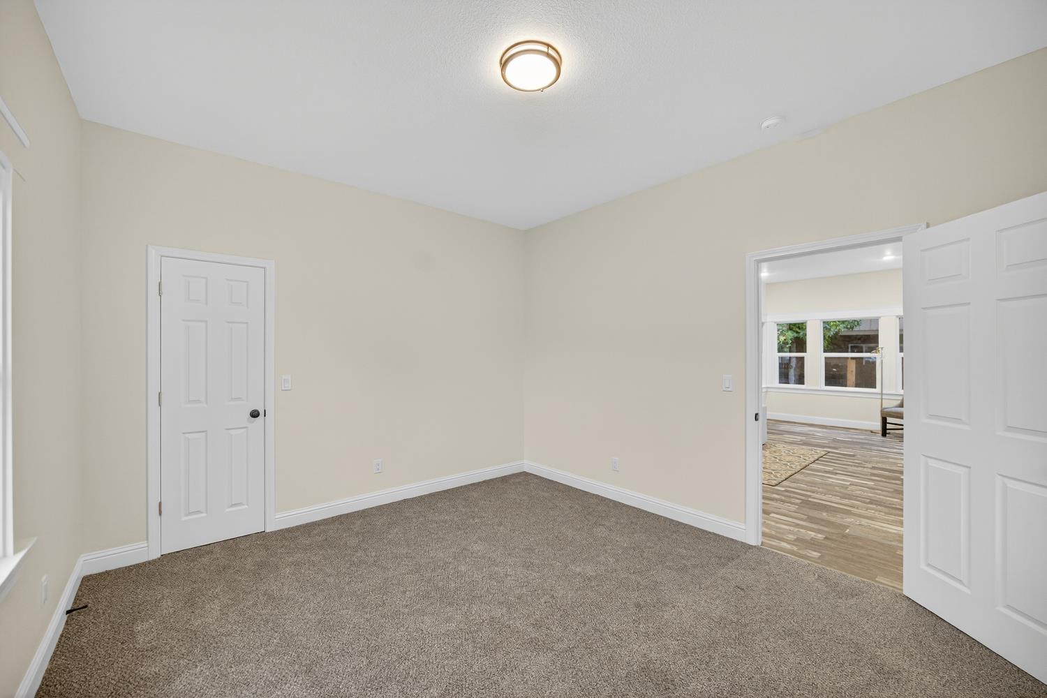 400 Pacific Lodi, CA 95242 - Photo 19 of 50 an empty room with windows and entrance