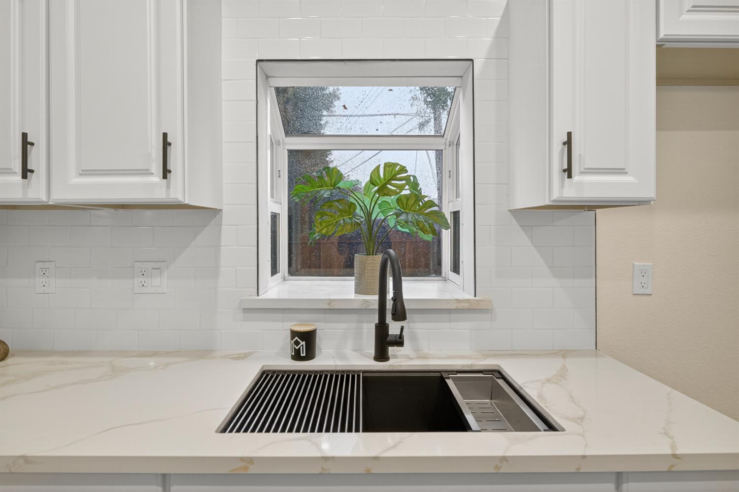 400 Pacific Lodi, CA 95242 - Photo 31 of 50 a kitchen with a sink and cabinets