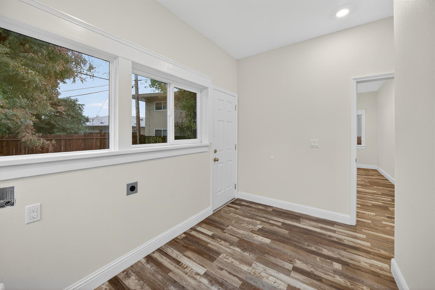 400 Pacific Lodi, CA 95242 - Photo 35 of 50 a view of a room with wooden floor and windows