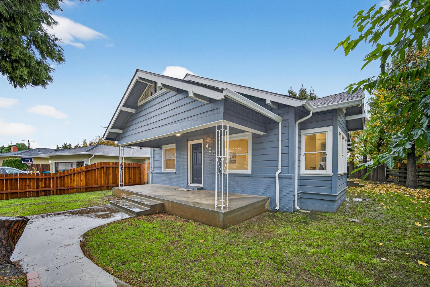 400 Pacific Lodi, CA 95242 - Photo 44 of 50 front view of a house with a yard