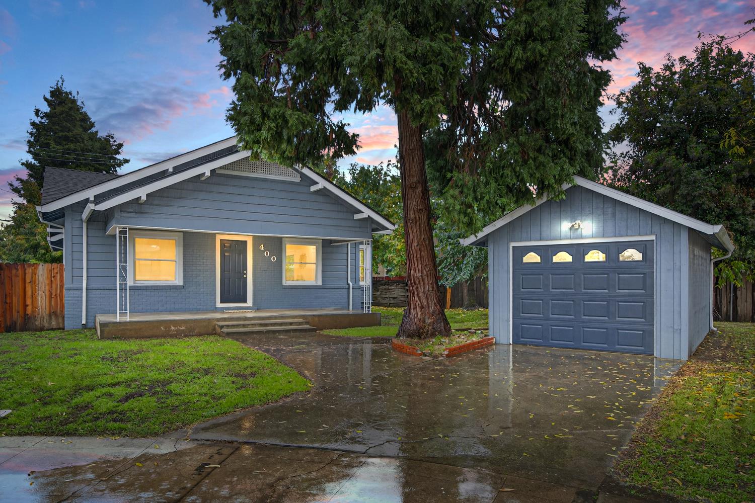 400 Pacific Lodi, CA 95242 - Photo 48 of 50 a front view of a house with a yard