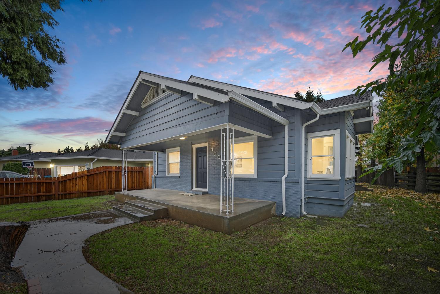 400 Pacific Lodi, CA 95242 - Photo 50 of 50 a front view of a house with a yard